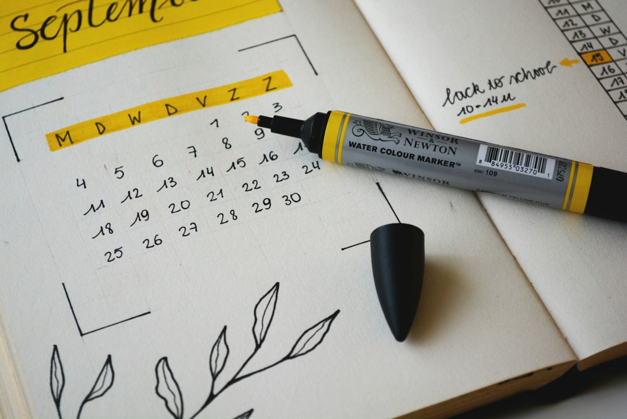 Calendar and planner used to schedule long-term goal reviews